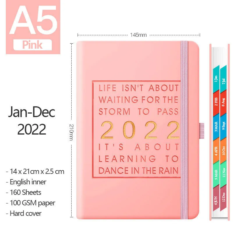 A5 imitation leather notebook with French fold binding open flat on a desk, seven colour options