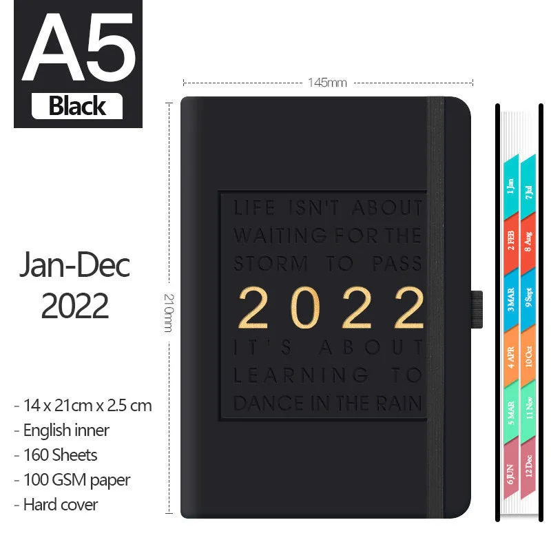 A5 imitation leather notebook with French fold binding open flat on a desk, seven colour options