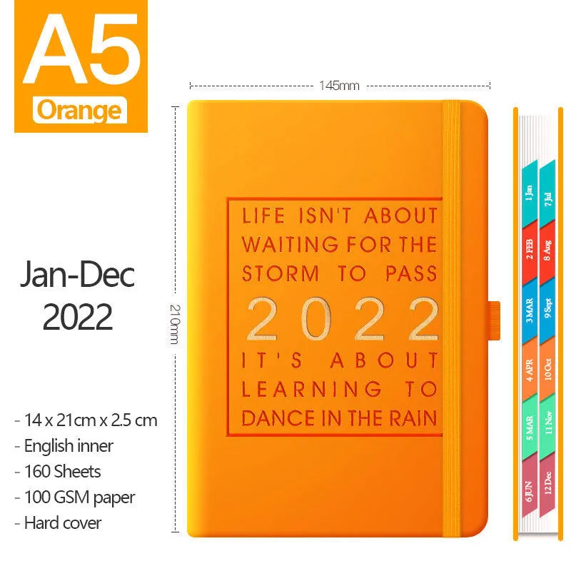 A5 imitation leather notebook with French fold binding open flat on a desk, seven colour options