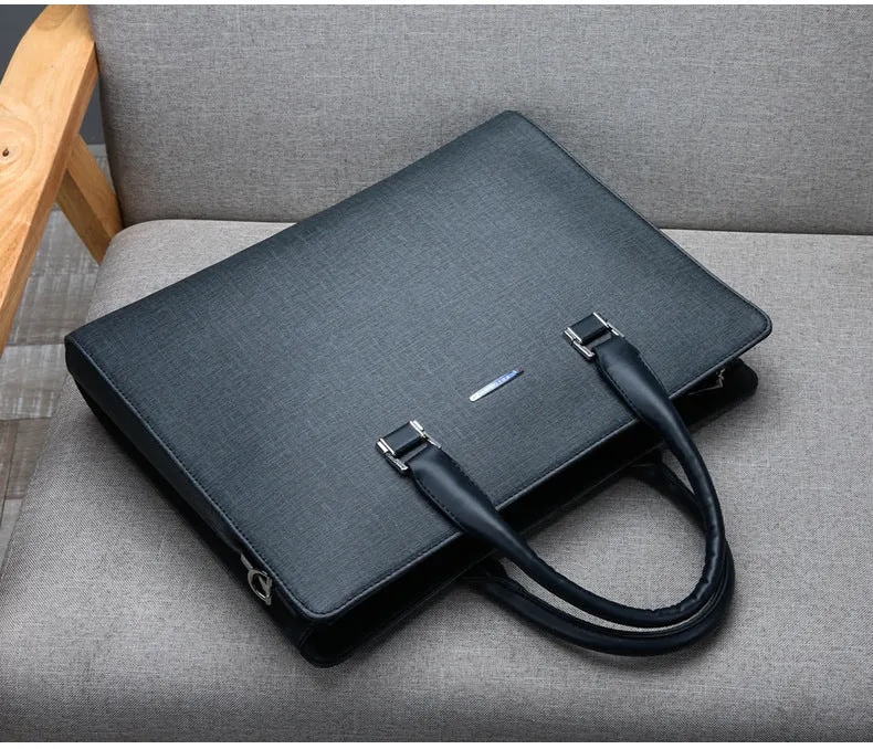 One-shoulder cross-slung male business briefcase in PU leather, horizontal square shape, black colour, zipper closure, stitched detailing