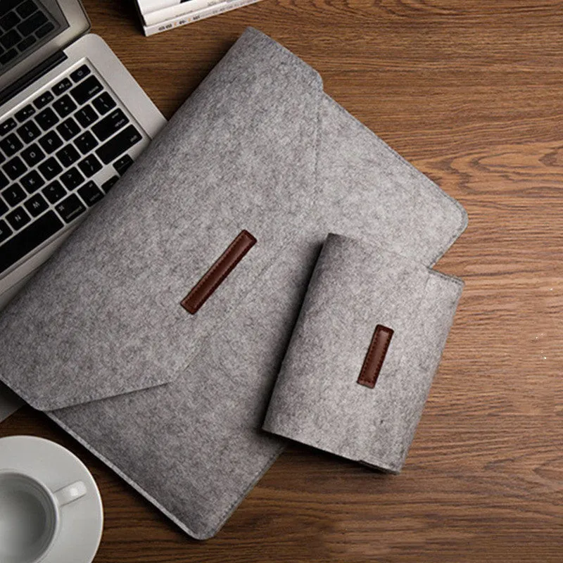 Waterproof laptop and tablet power pack bag with multiple internal compartments, black colour option
