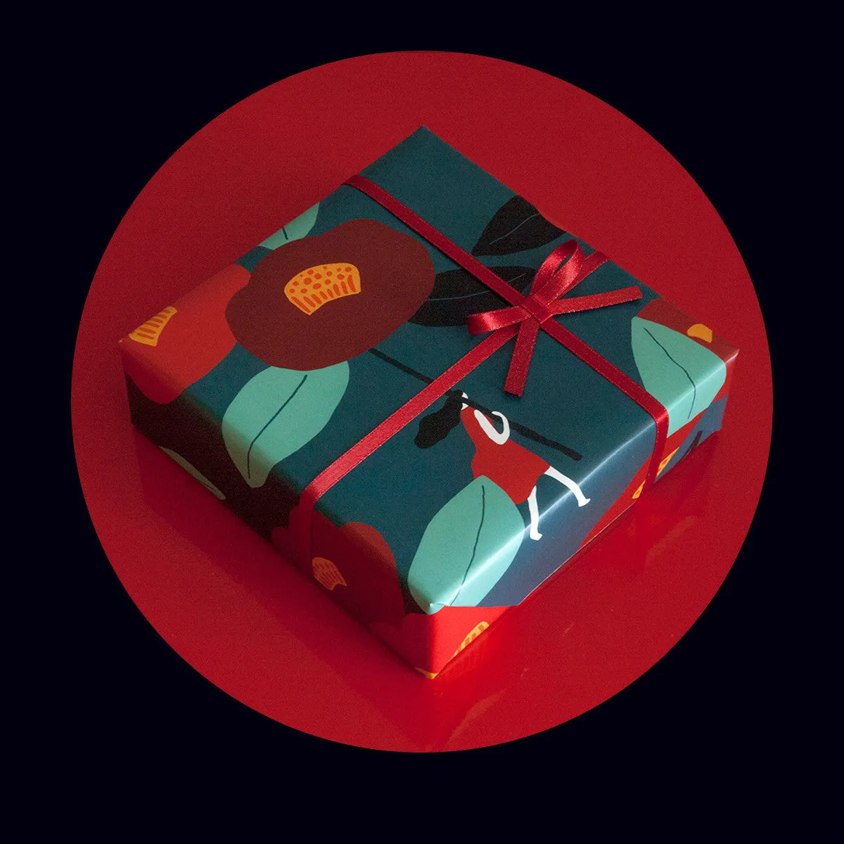 Green waterproof Christmas gift wrapping paper with Camellia design and black ribbon for gift boxes