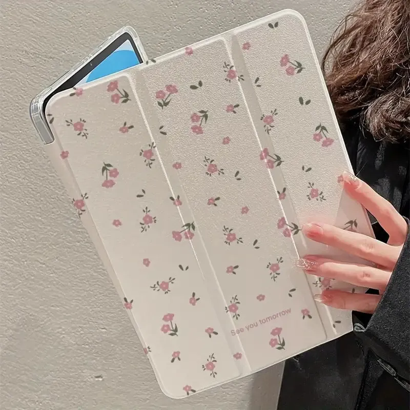 Transparent floral patterned iPad case showing three-fold magnetic stand positions