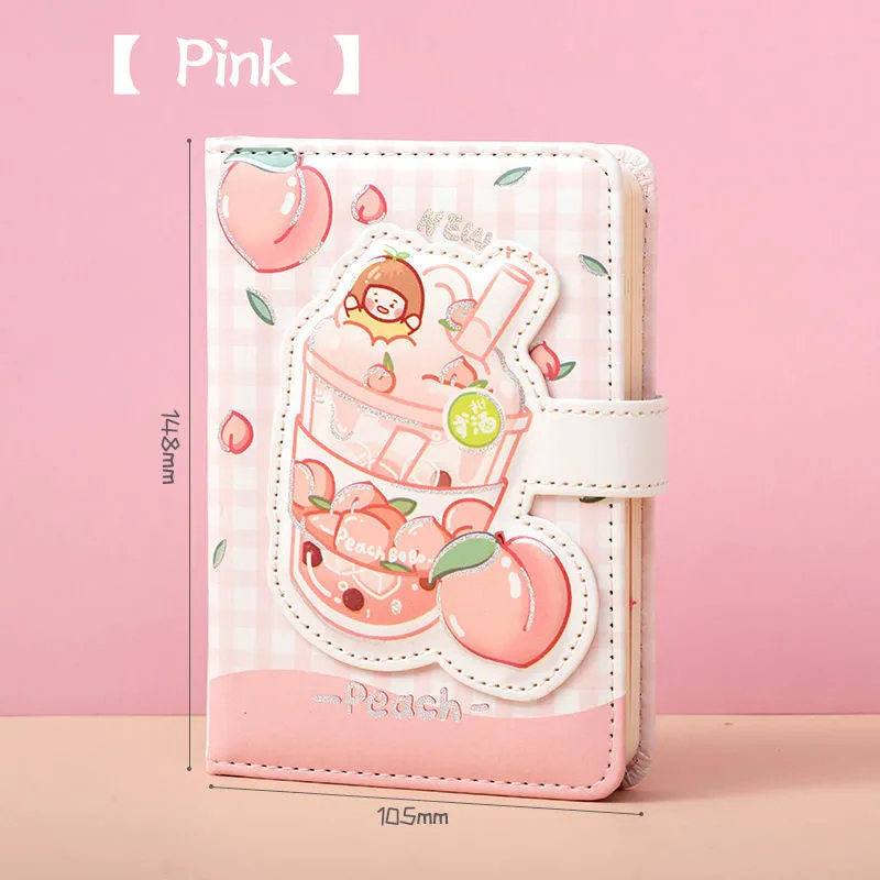 Cute magnetic buckle notebook with heart design in pink, yellow, green, and purple colours on white background