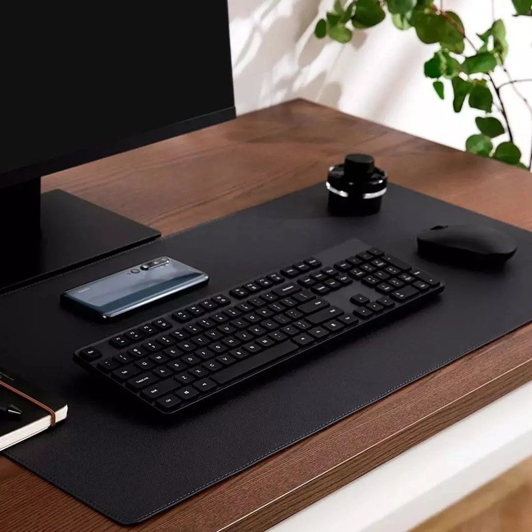 Extra large 800x400mm black gaming mouse pad with double-material waterproof construction on a desk