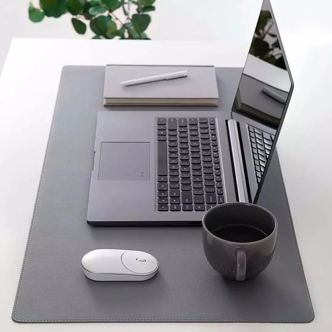 Extra large 800x400mm black gaming mouse pad with double-material waterproof construction on a desk