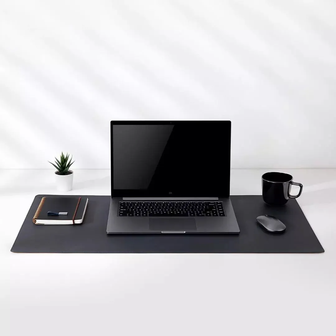 Extra large 800x400mm black gaming mouse pad with double-material waterproof construction on a desk