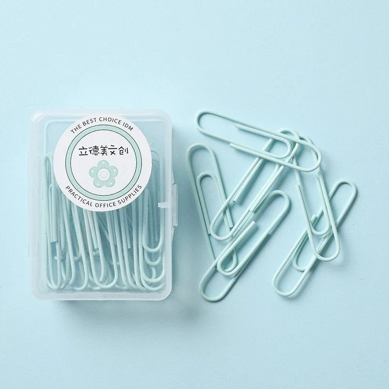 Set of macaron colour alloy paper clips in pink, green, and purple, showing 28mm and 50mm sizes, on a light background