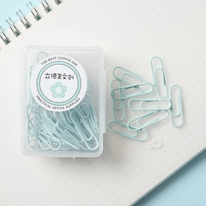 Set of macaron colour alloy paper clips in pink, green, and purple, showing 28mm and 50mm sizes, on a light background