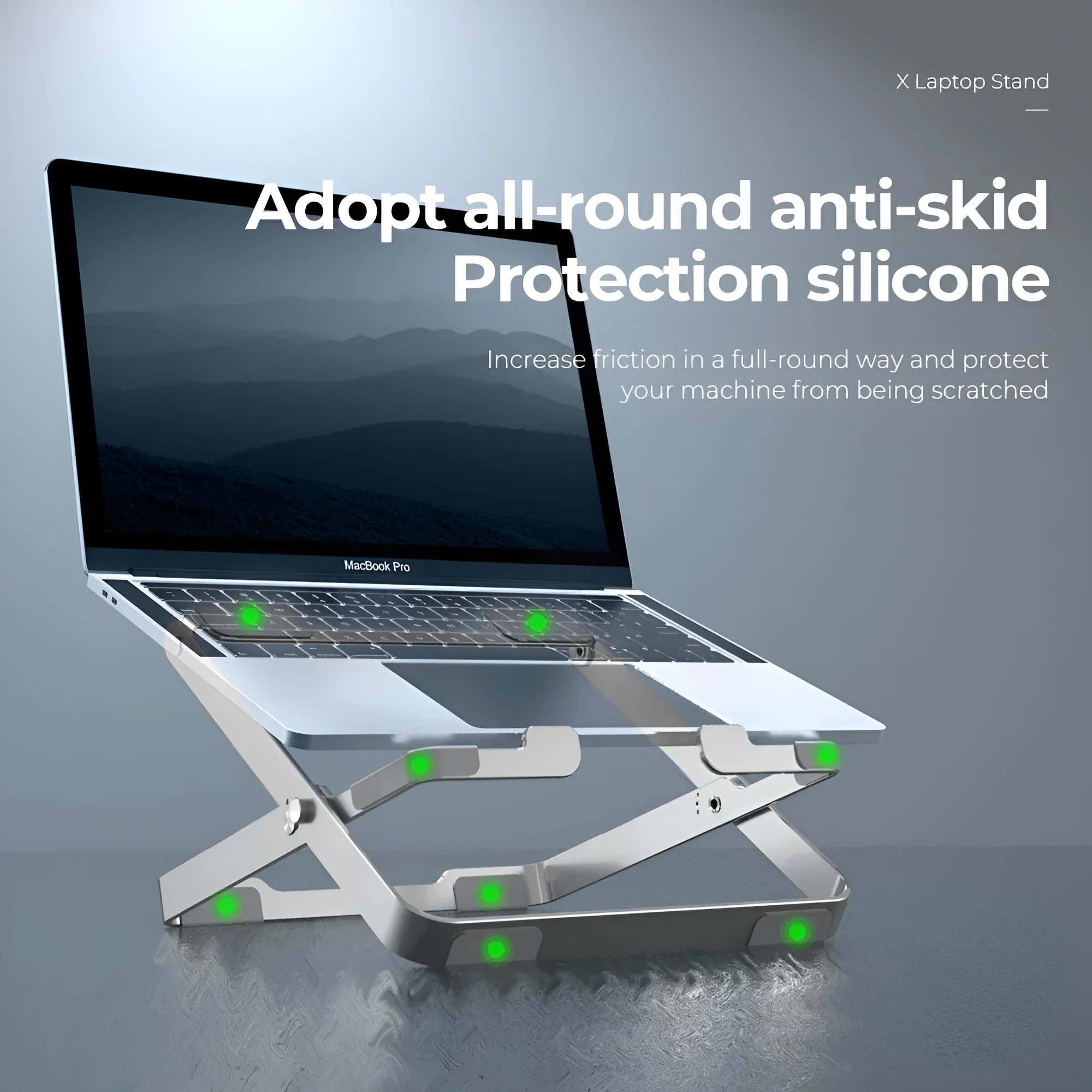 Folding silver grey aluminium laptop stand with silicone pads in expanded position showing heat dissipation design