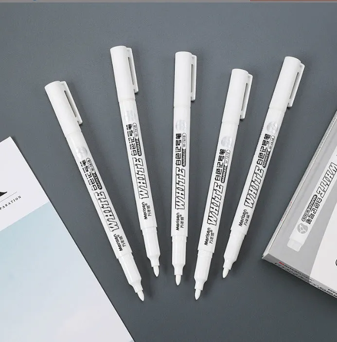 Super White Dazzling fine head painting pen with 2.8mm thick white tip, 14cm length, on dark surface