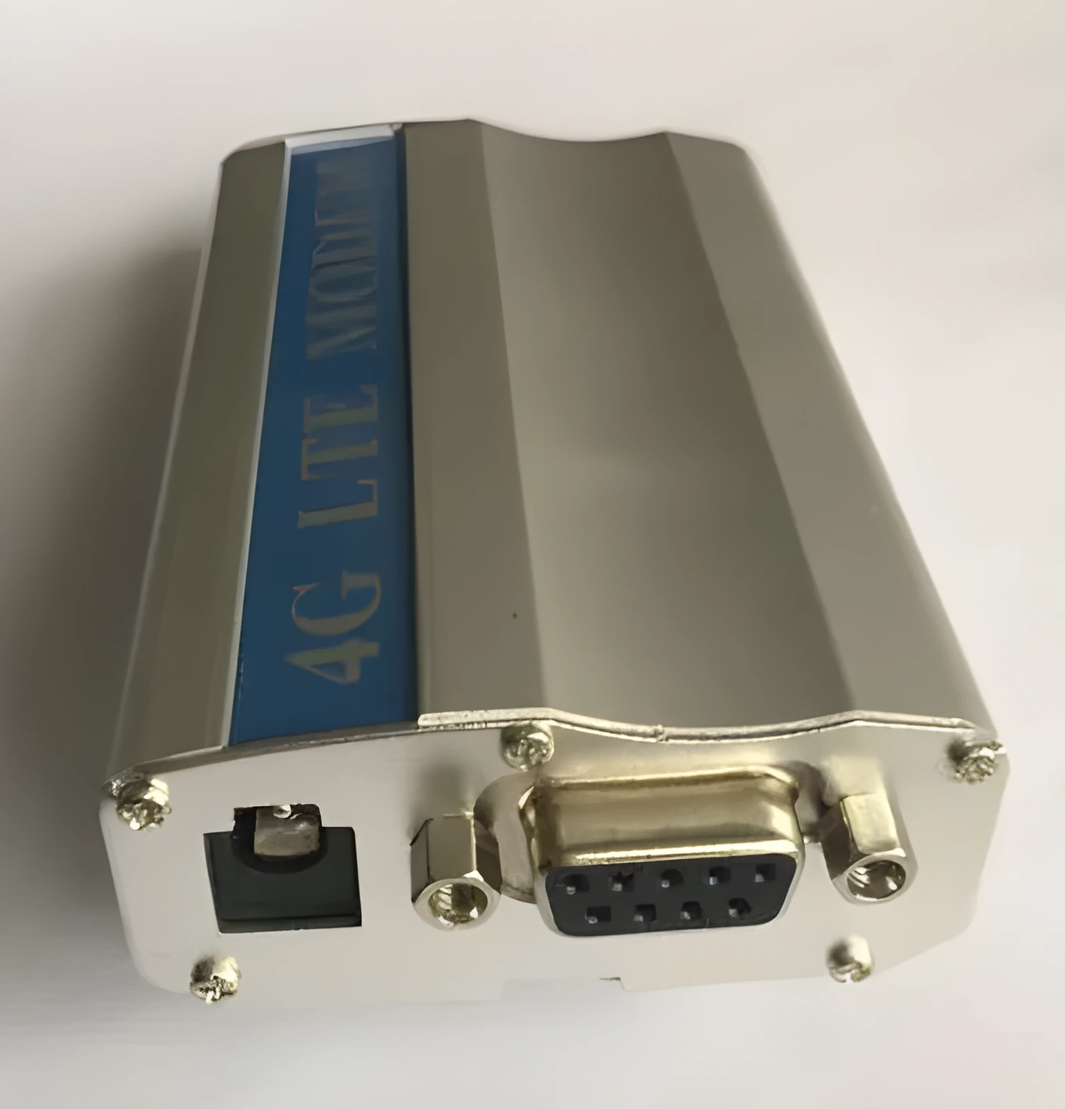 White SIM7600CE 4G LTE module with RS232 and USB ports, 30x30mm size
