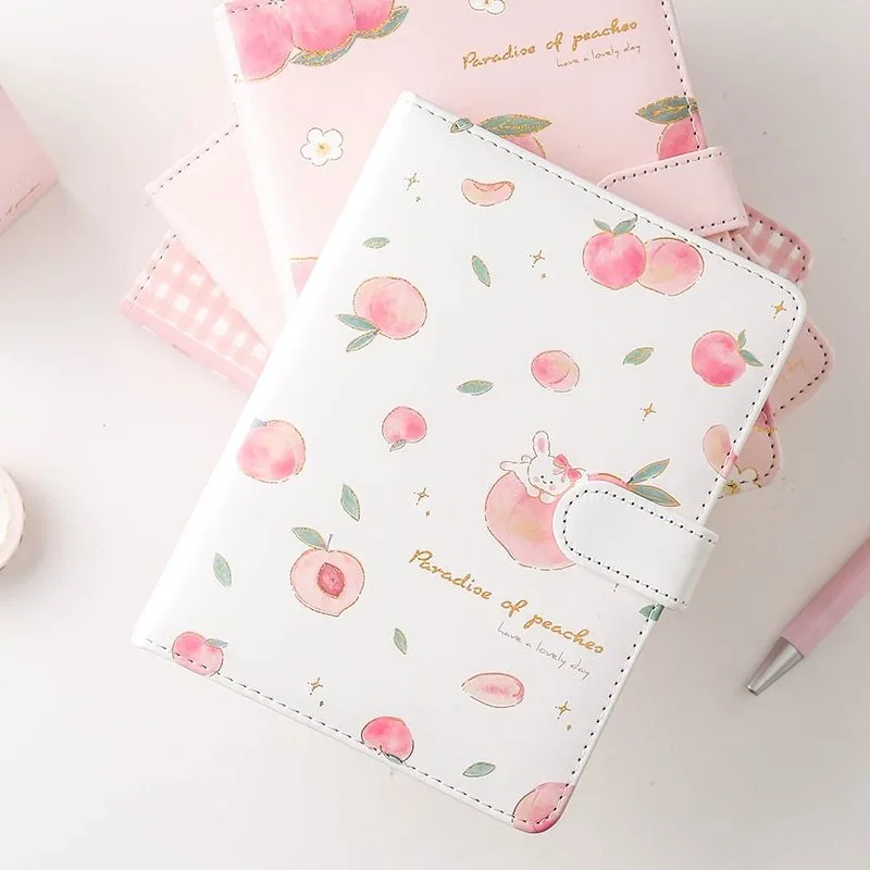 A5 hardcover student notebook with imitation leather cover in Peach Talk Feast design, wired binding, open flat