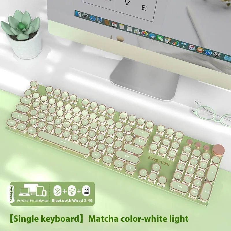 E-sports mechanical keyboard with multifunction knob and white backlighting in matcha green colour