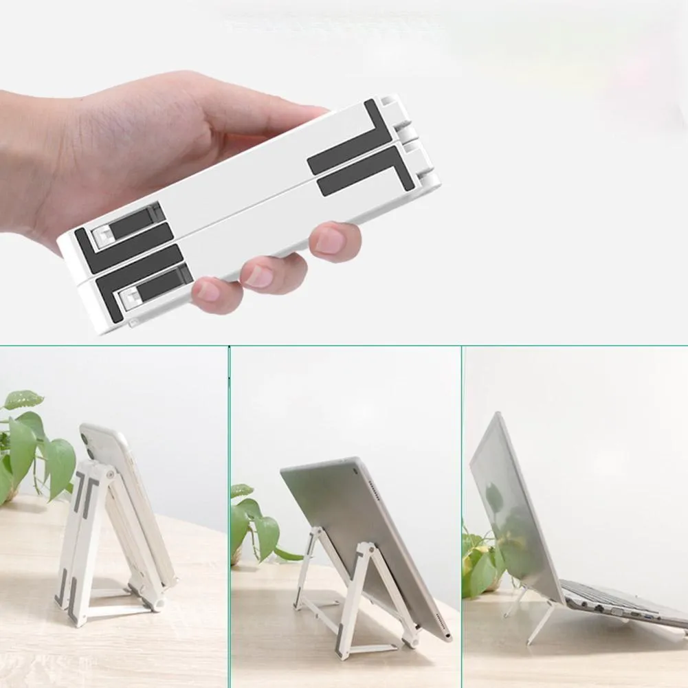 Grey multifunctional laptop stand with seven-shaped silicone grip on a flat surface