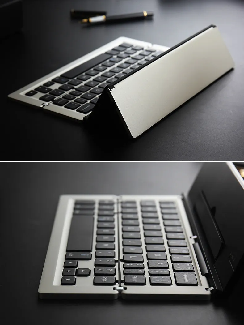 F18 three-fold folding aluminium alloy Bluetooth keyboard in golden, expanded view showing 58 keys