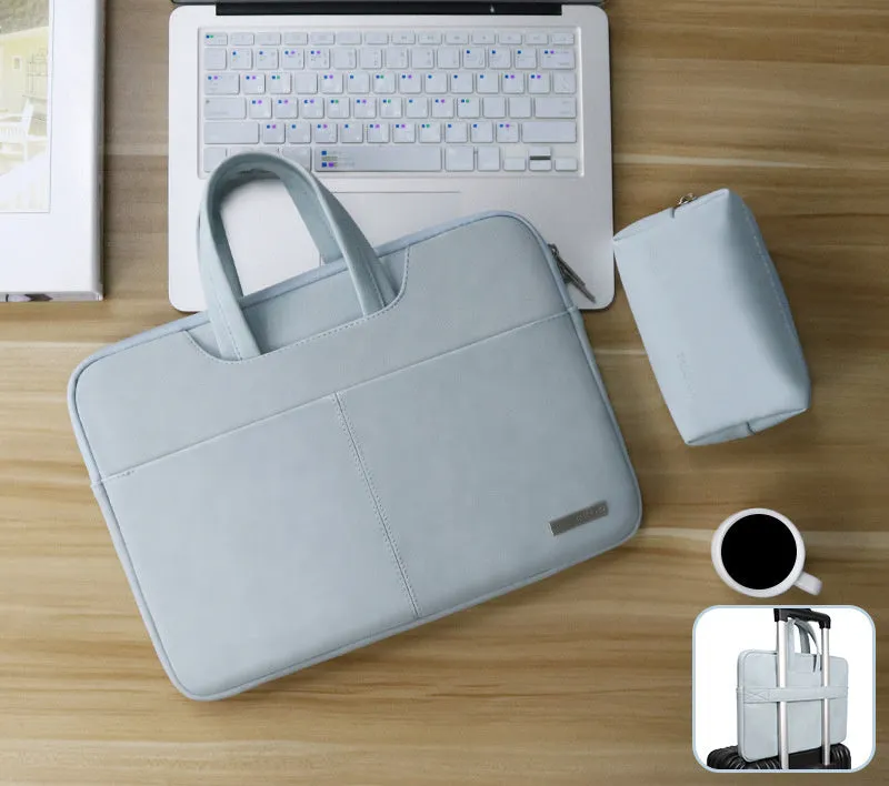 Blue PU leather laptop sleeve case with zipper open, showing internal shock-resistant liner and organisation pockets.
