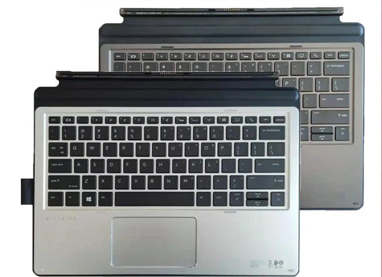 Wireless Bluetooth keyboard acting as a base for an HP Elite X2 tablet, showing multimedia keys.