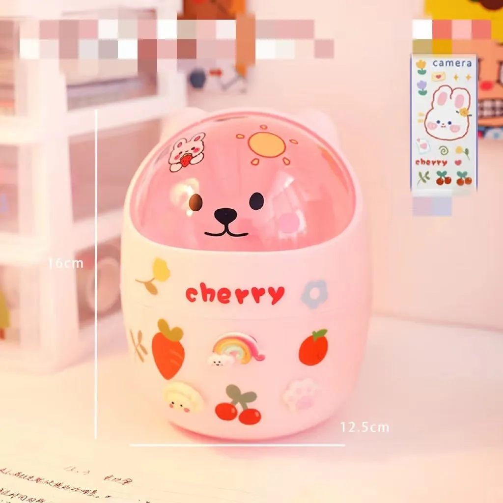 Plastic mini bear shaped desktop trash can with press-type lid in beige gray, includes stickers and garbage bags
