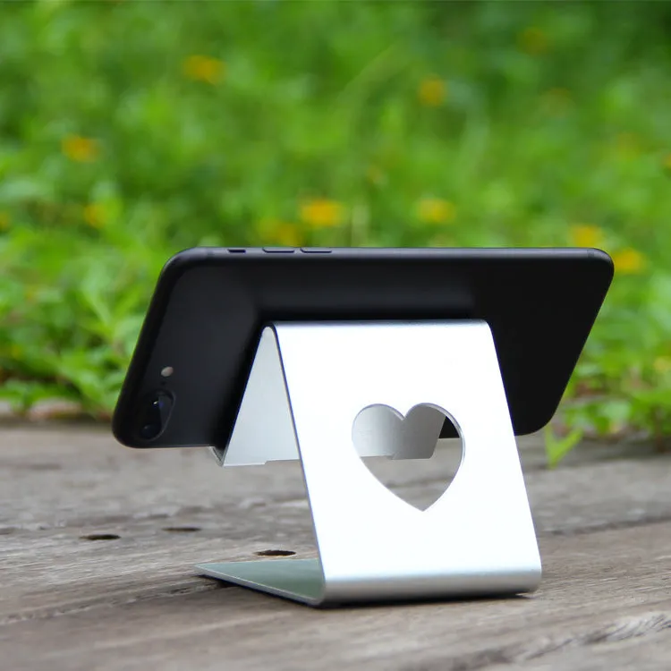 Aluminium alloy stand holding a tablet PC upright on a desk, black finish