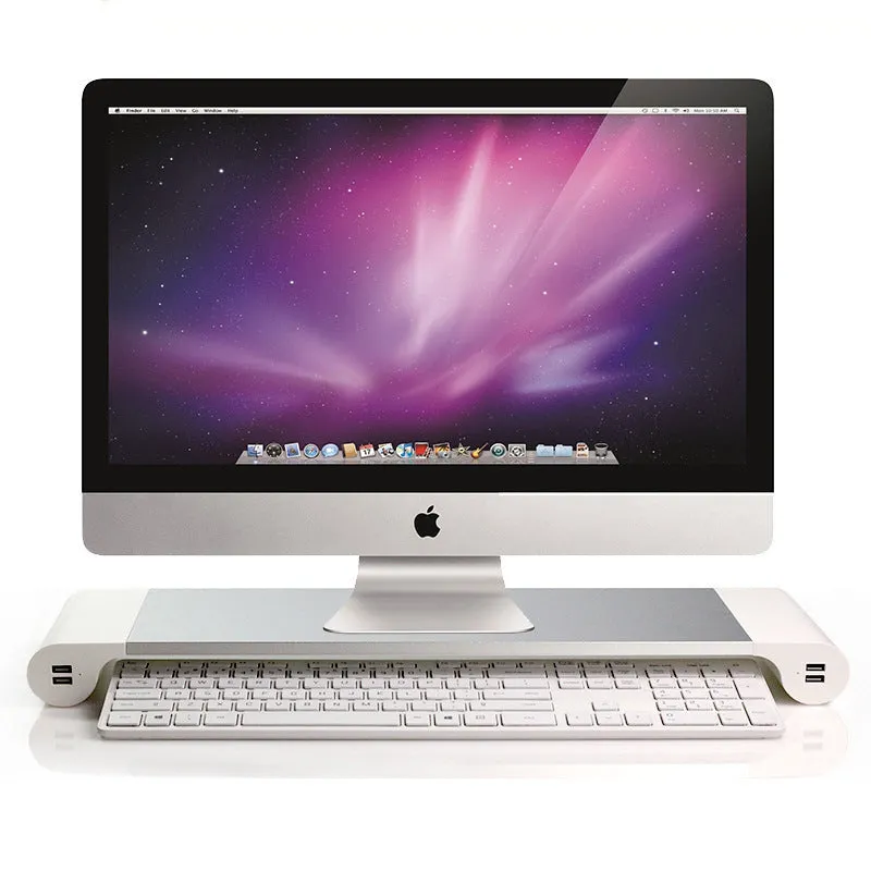 Silver aluminium alloy notebook computer heighten base bracket with USB charging port on a desk
