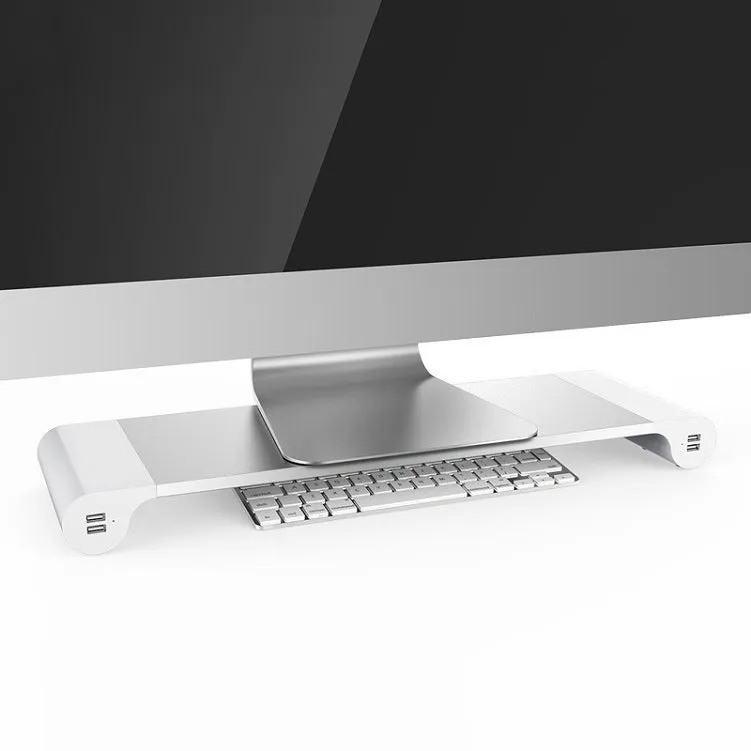 Silver aluminium alloy notebook computer heighten base bracket with USB charging port on a desk