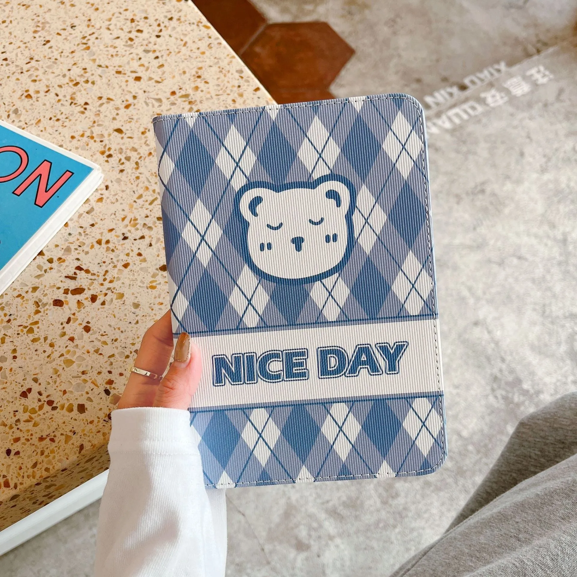 Cartoon protective flat case for iPad with black and brown plaid bear design, flip cover, silicone and TPU construction