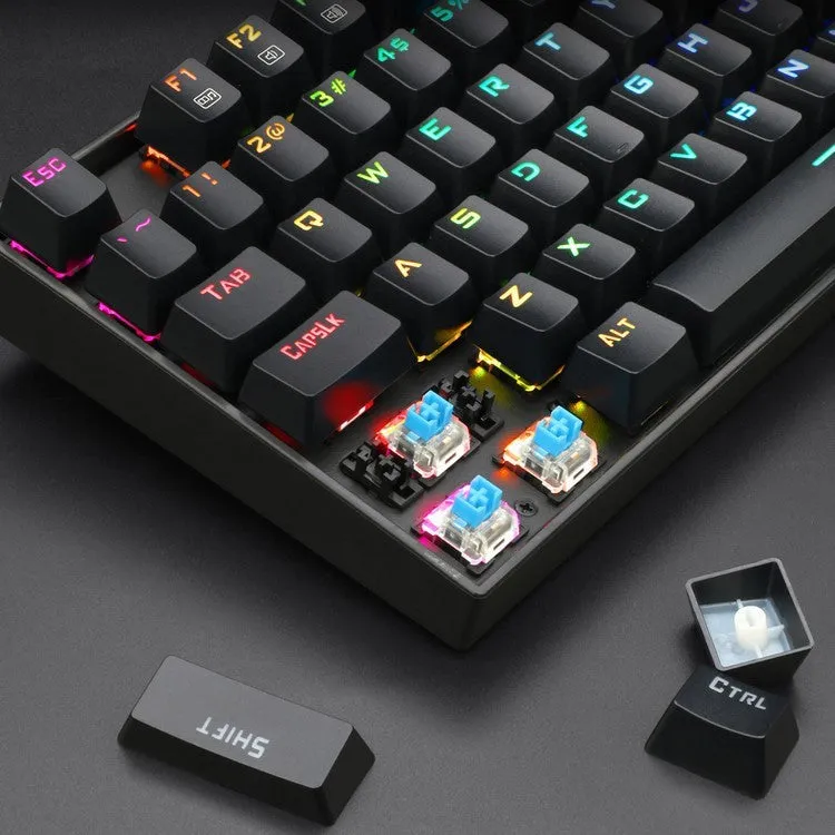 Monochrome luminous wired mechanical green axis keyboard set with mouse and headphones on a desk