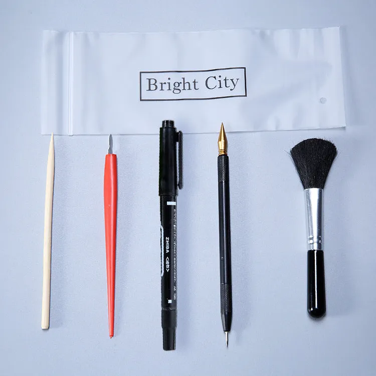 Scraping painting tools set with multiple implements for textured artwork creation
