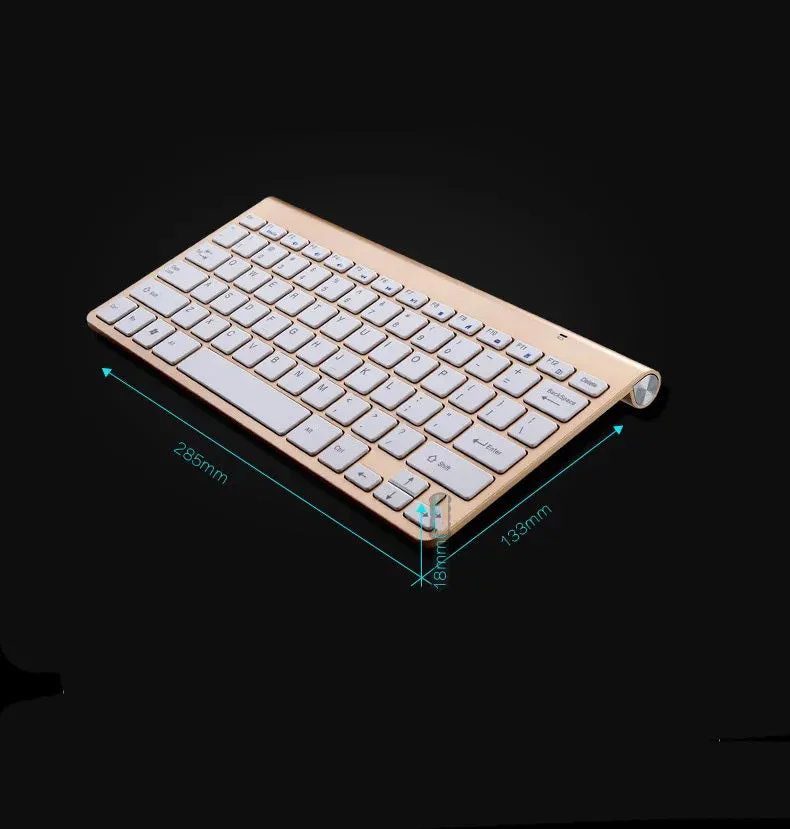 Wireless keyboard and mouse set with slim 10mm keyboard in gold colour on white background