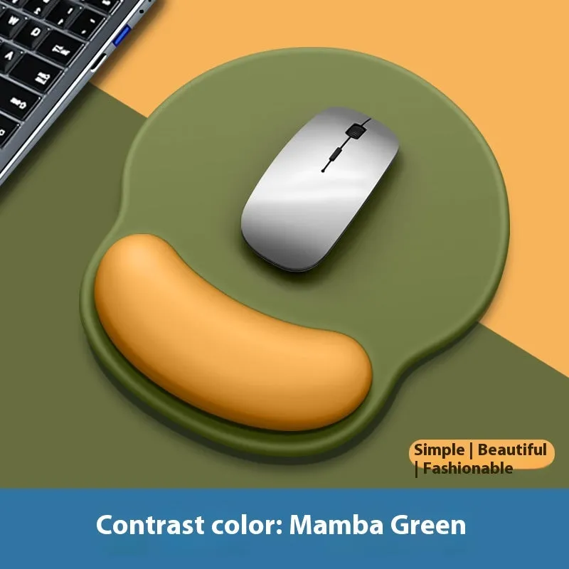 Silicone mouse mat with wrist support in a gradient blue colour on a desk.