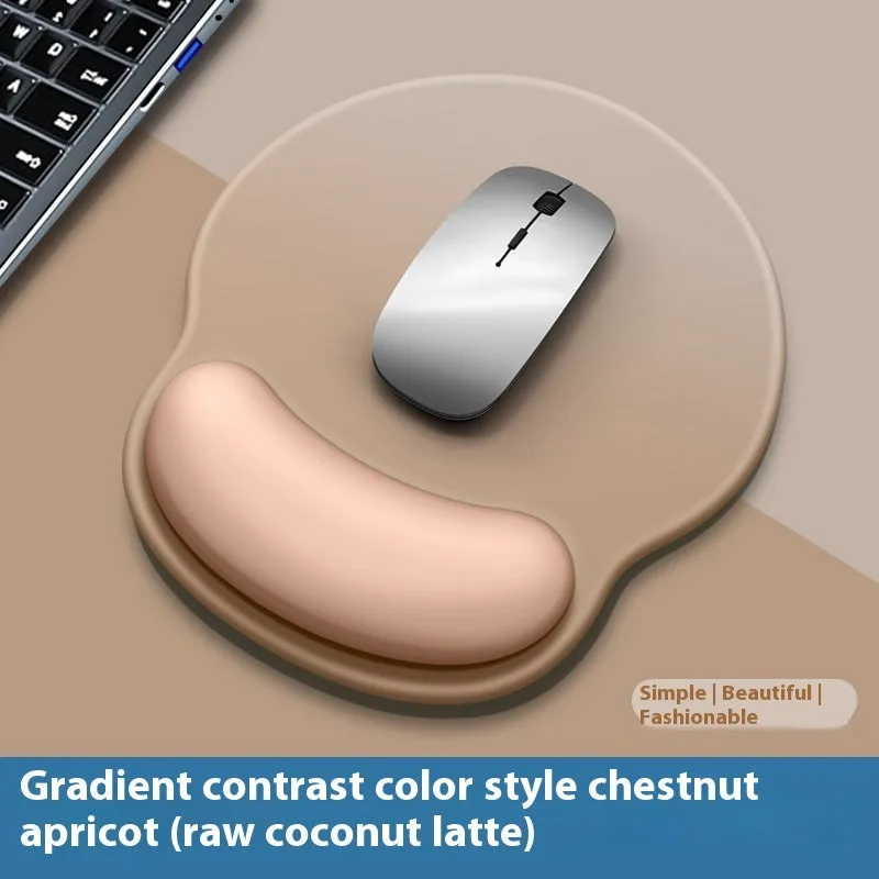 Silicone mouse mat with wrist support in a gradient blue colour on a desk.