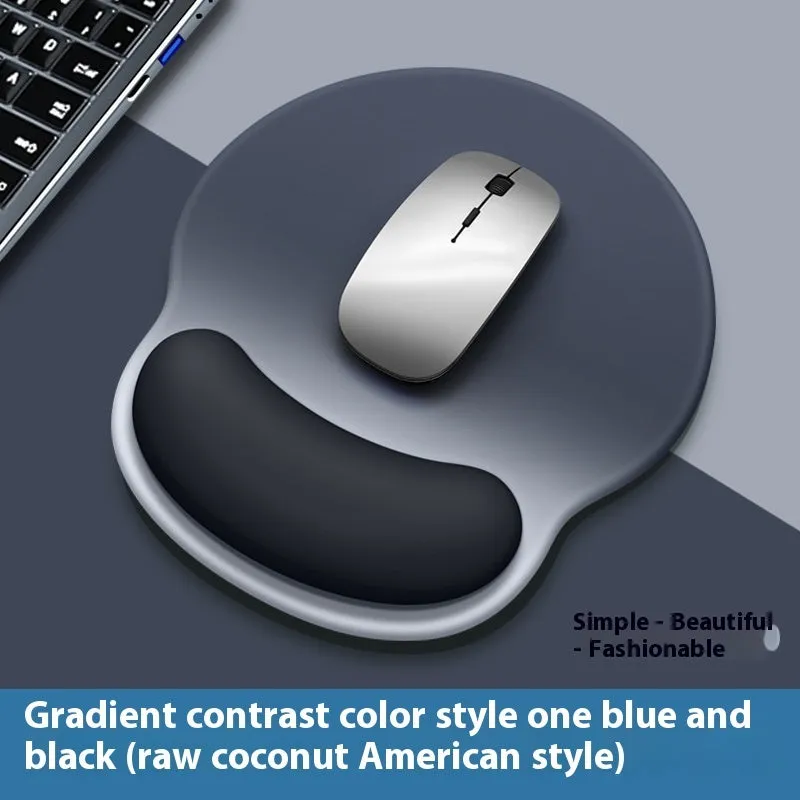 Silicone mouse mat with wrist support in a gradient blue colour on a desk.