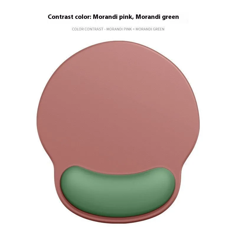 Silicone mouse mat with wrist support in a gradient blue colour on a desk.