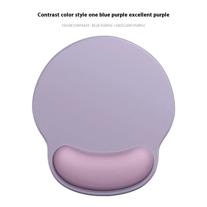 Silicone mouse mat with wrist support in a gradient blue colour on a desk.