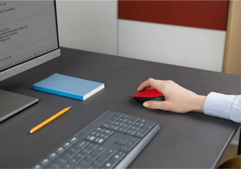 Small portable wireless mouse in red, blue, and grey with USB receiver
