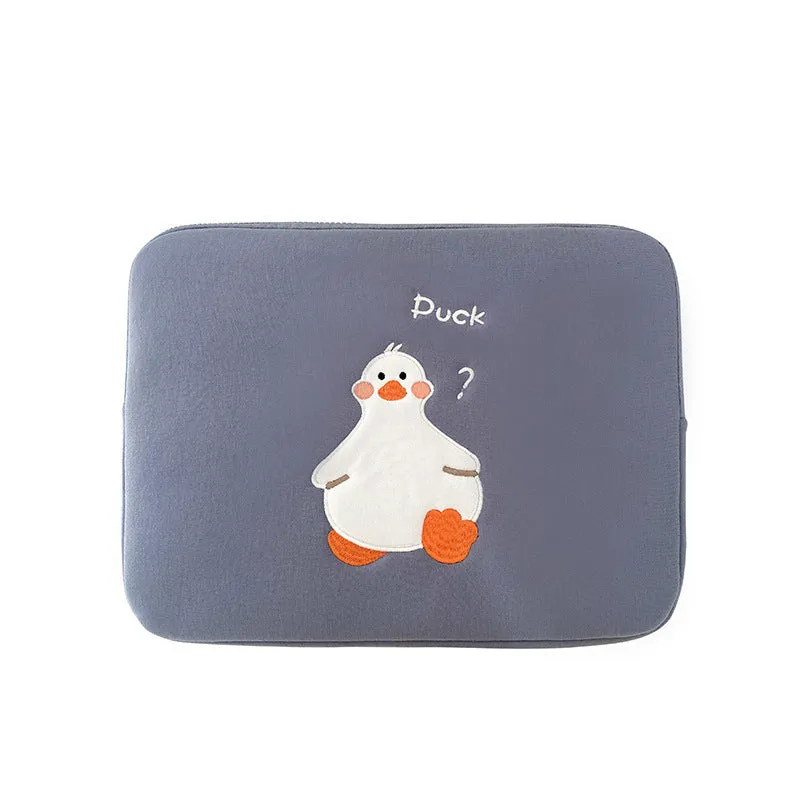 Blue cotton tablet case with embroidered cartoon duck design and a zipper closure.