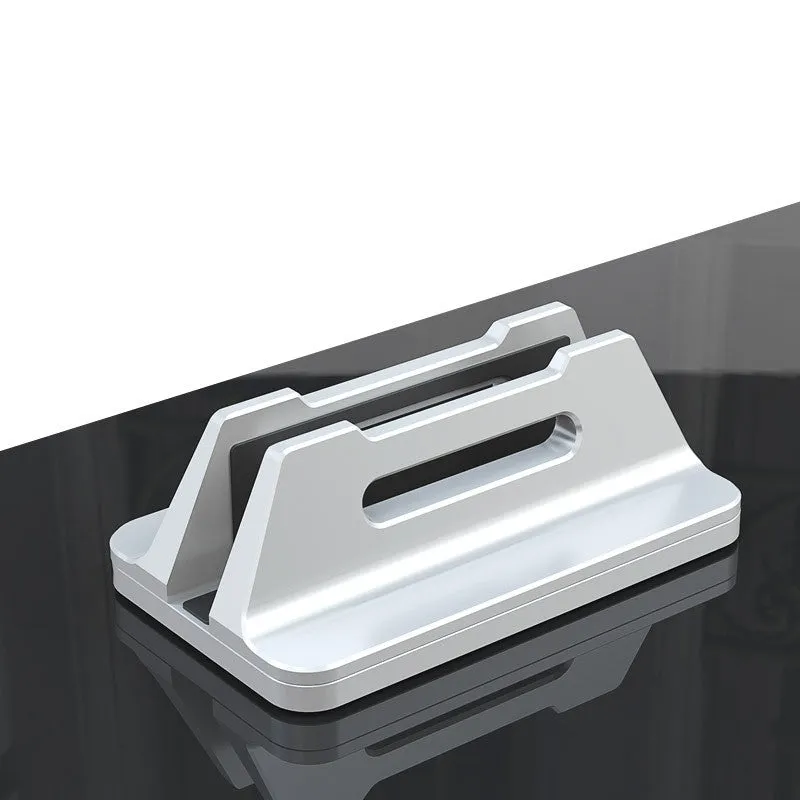 Silver aluminium alloy vertical notebook storage bracket on desk holding a laptop upright
