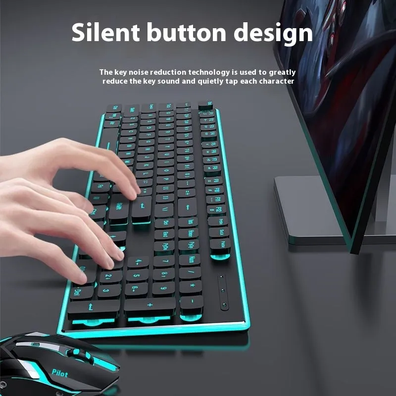 Wireless mute Bluetooth keyboard in pink or white on a desk next to a phone.