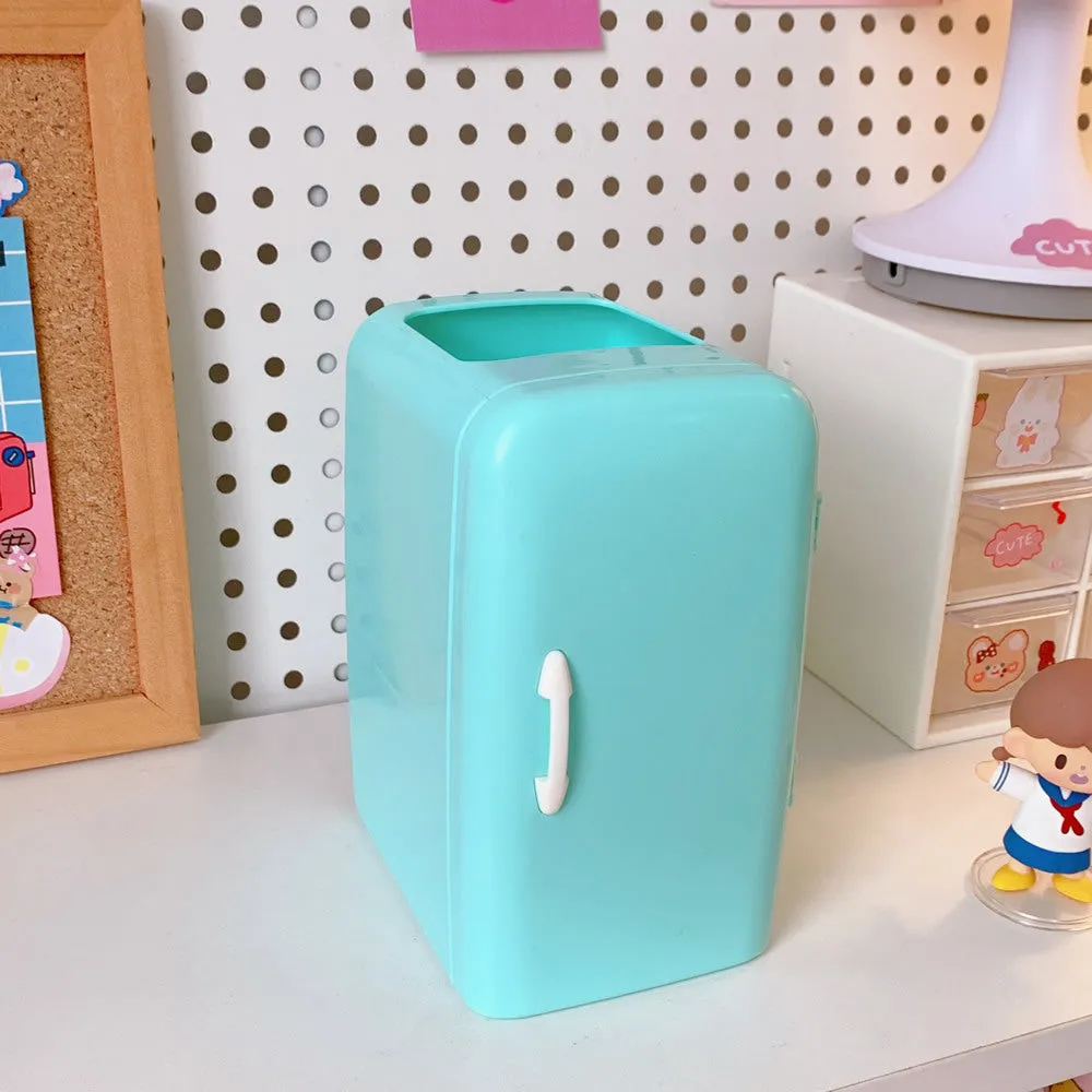 Creative refrigerator-shaped plastic pencil case in white, light blue, and pink colour options on a desk