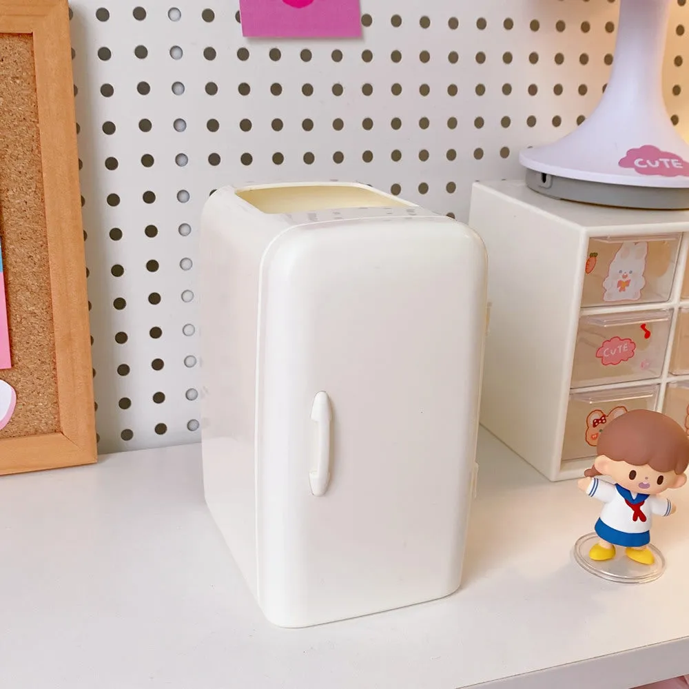 Creative refrigerator-shaped plastic pencil case in white, light blue, and pink colour options on a desk