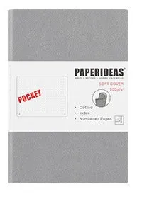 Soft leather A6 notebook open to blank pages, with imitation leather cover in black, fog blue, and avocado green options