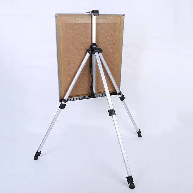 Silver adjustable aluminium alloy easel folded for transport with black carrying bag and shoulder strap