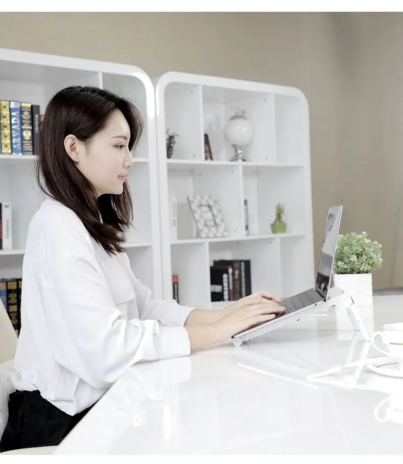 Folding notebook computer stand in black, expanded with three adjustable angle gears, shown with a laptop