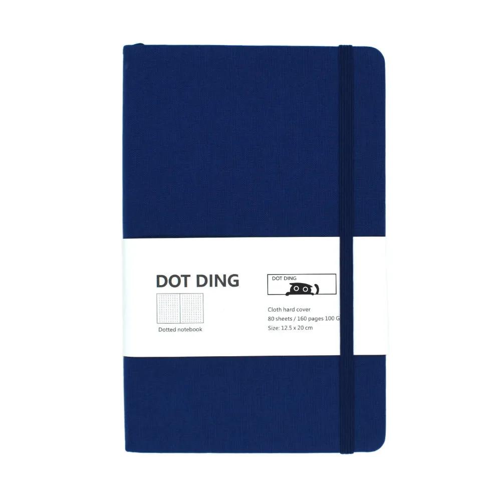A5 dot grid bullet journal with fabric hard cover in blue, showing open pages with dot grid spread