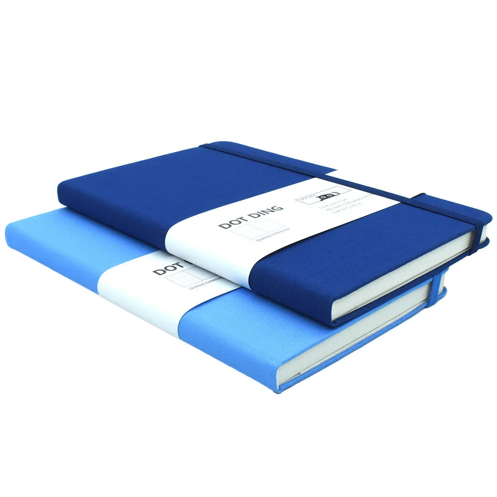 A5 dot grid bullet journal with fabric hard cover in blue, showing open pages with dot grid spread
