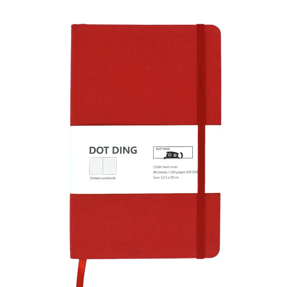 A5 dot grid bullet journal with fabric hard cover in blue, showing open pages with dot grid spread
