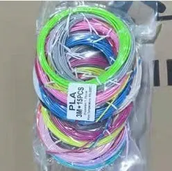 Children's 3D printing pen set with yellow pen, USB cable, and 3-colour filament on a table