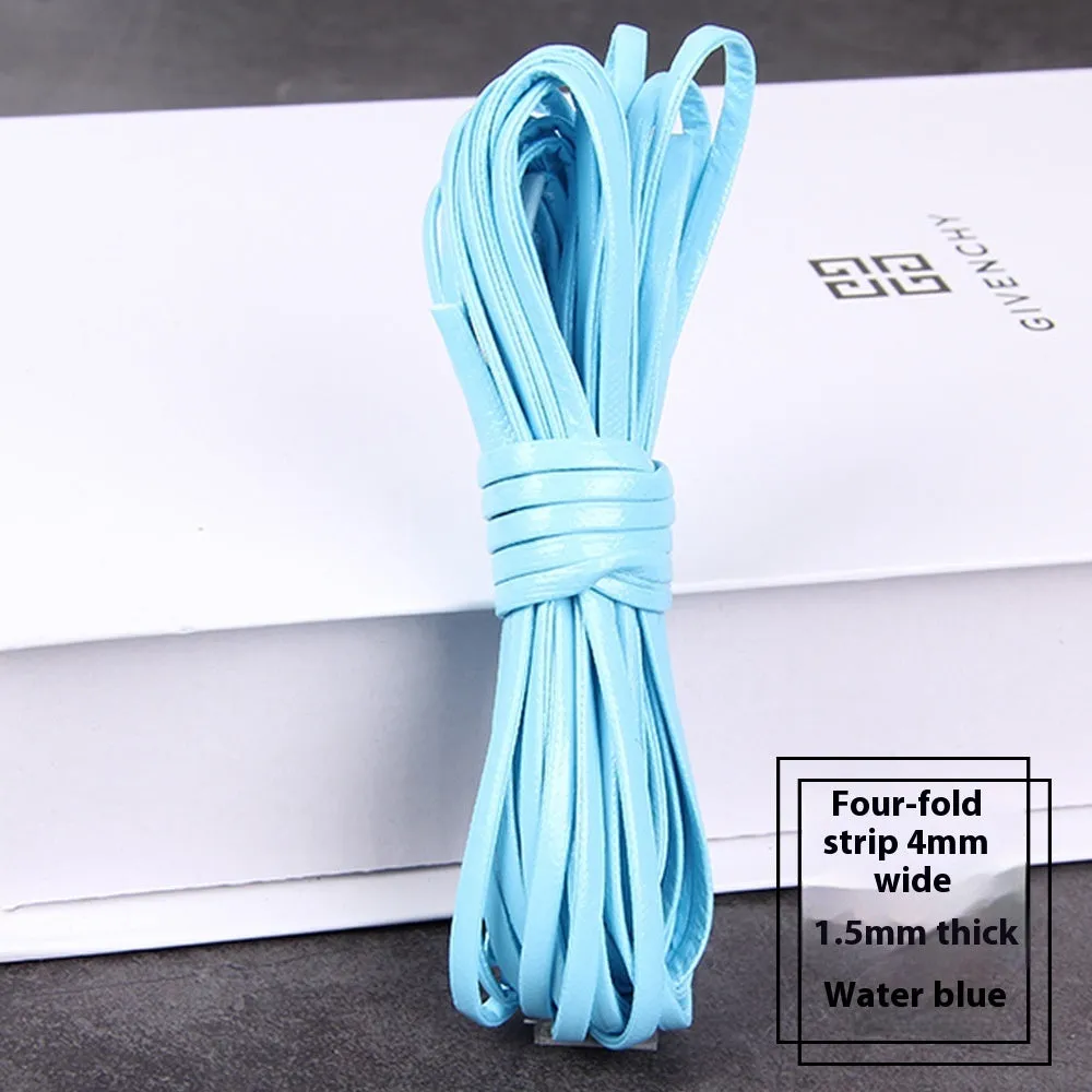 Rolls of PU leather weaving cord in various colours and widths for DIY craft projects.