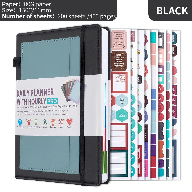 A5 notebook with PU leather cover in various colours, shown open to reveal blank pages and planning stickers.